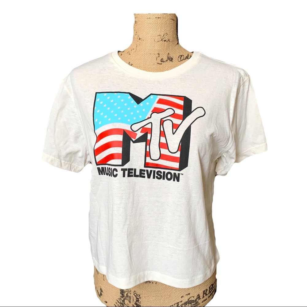 MTV New Women crop tee in a light cream color.